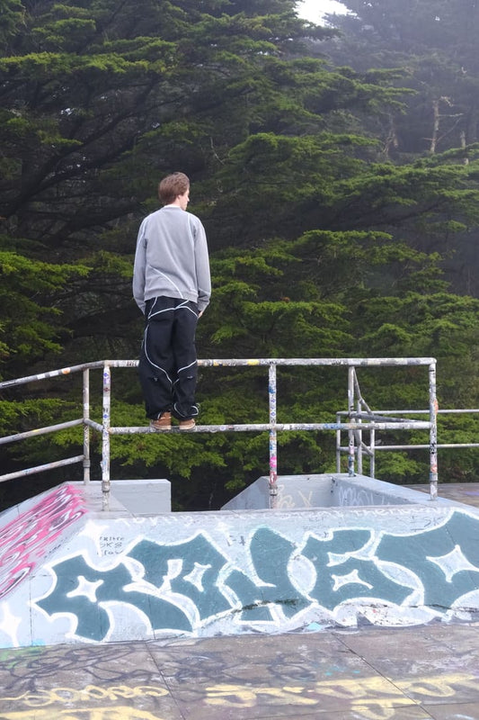 August standing at a skatepark in ScervGear garments.