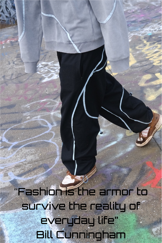 Picture of ScervGear pants and sweatshirt with the quote "Fashion is the armor to survive the reality of evryday life" by Bill Cunningham
