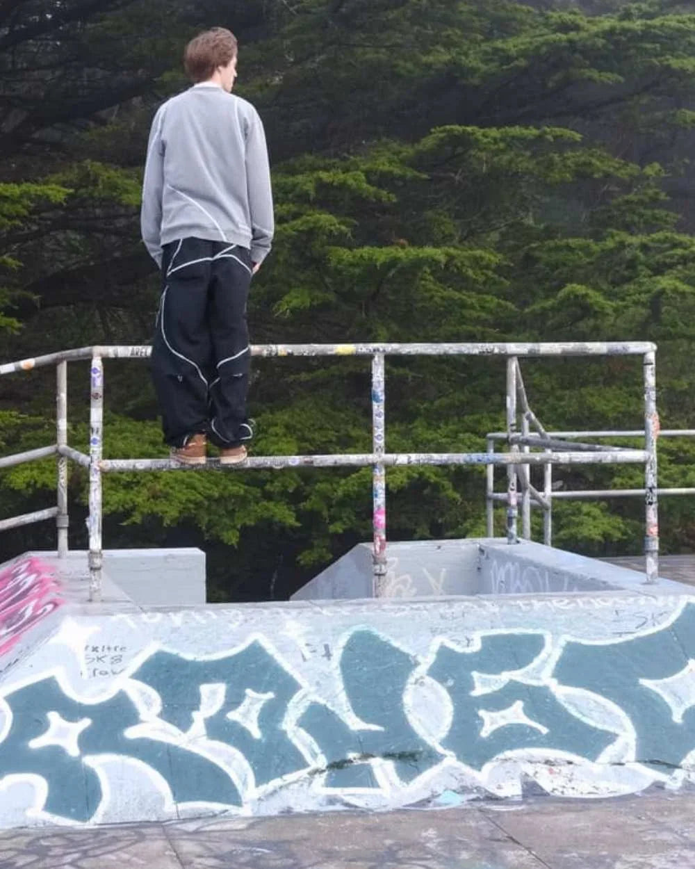 August standing at a skatepark in ScervGear garments.