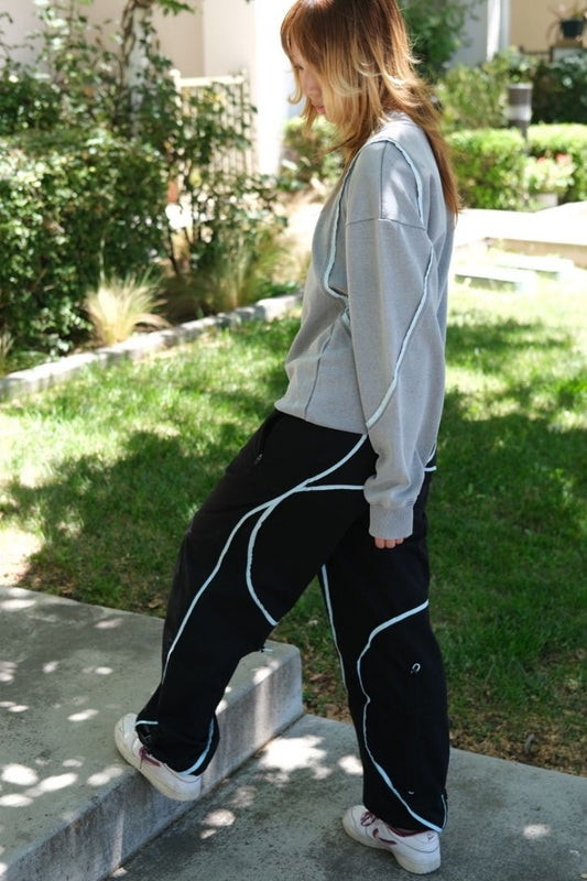 Model in ScervGear Curvy Baggy Pants and Swervy Sweatshirt