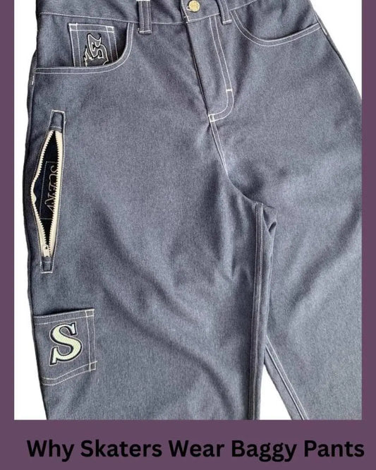 Gray baggy skate pants with wide legs and utility pocket, showing relaxed fit designed for movement and comfort while skating